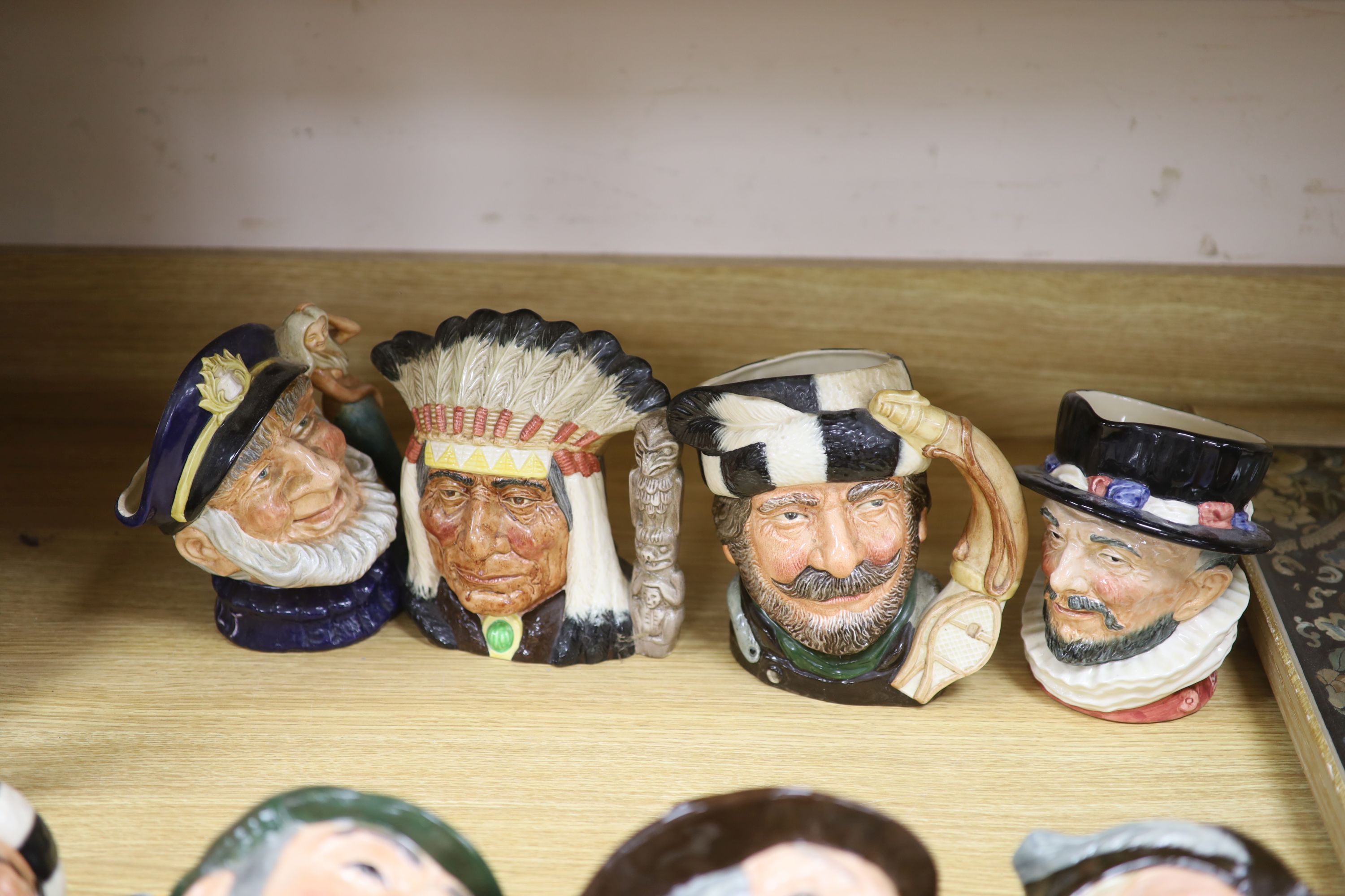 Eleven Doulton character jugs